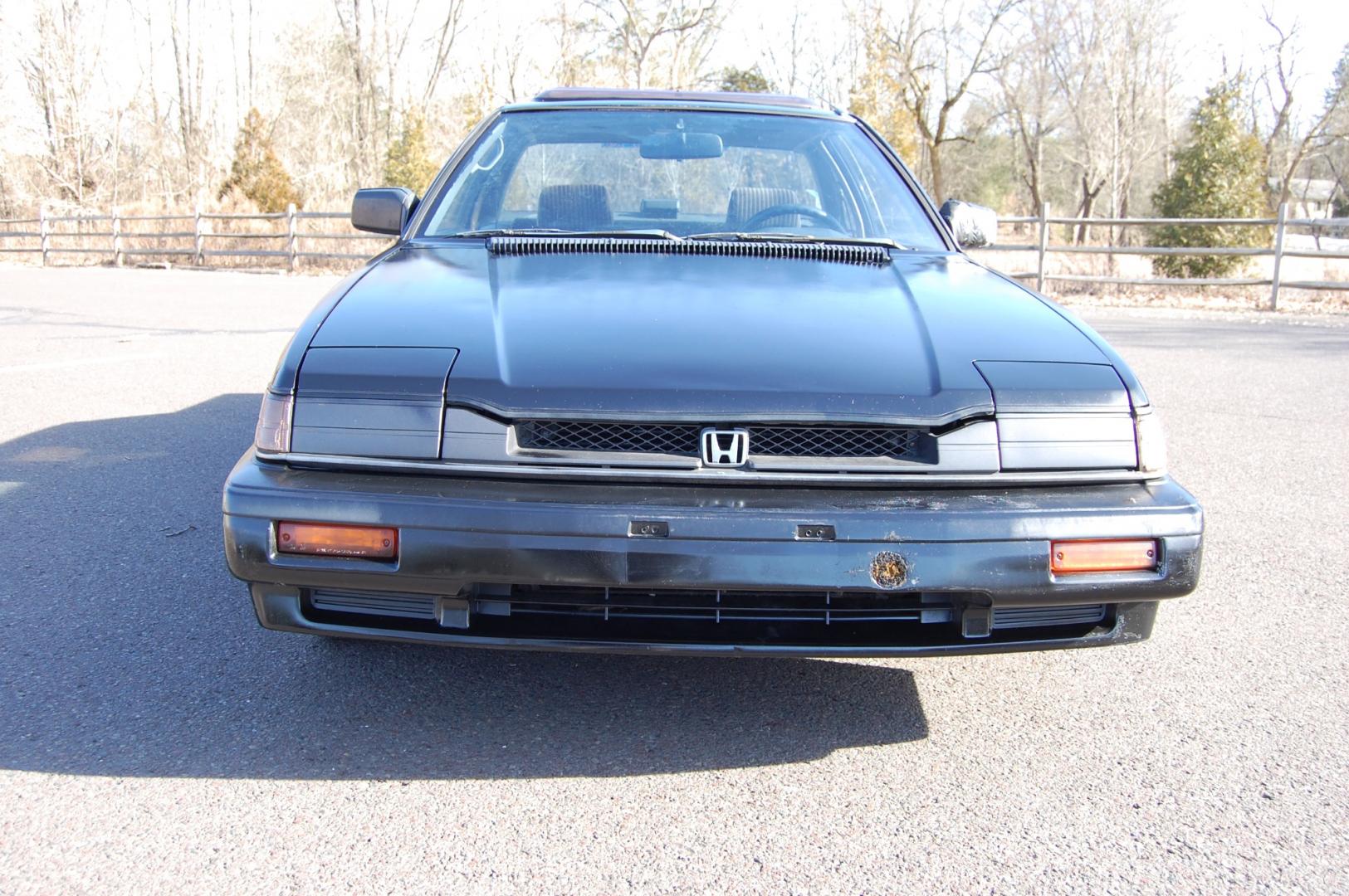 1987 Black /Gray Honda Prelude Si (JHMBA3248HC) with an 2.0L 4 cylinder engine, Automatic transmission, located at 6528 Lower York Road, New Hope, PA, 18938, (215) 862-9555, 40.358707, -74.977882 - Here we have a 1987 Honda Prelude SI with a 2.0L 4 cylinder putting power to the front wheels via an automatic transmission. Options include: gray cloth, power windows/locks/mirrors, AM/FM/TAPE radio, heat/AC, cruise control, tilt steering wheel, 13 inch alloy wheels, pop up headlights and a moon ro - Photo#6